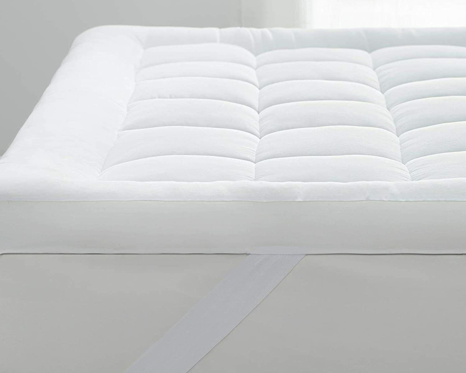Zoned spring wool mattress topper